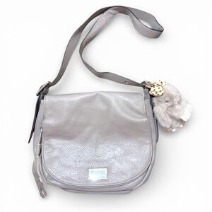 Juicy Couture Rosa vegan leather saddle bag/Crossbody adjustable strap10”x11”